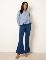 Flared Cross Over Waistband Jeans